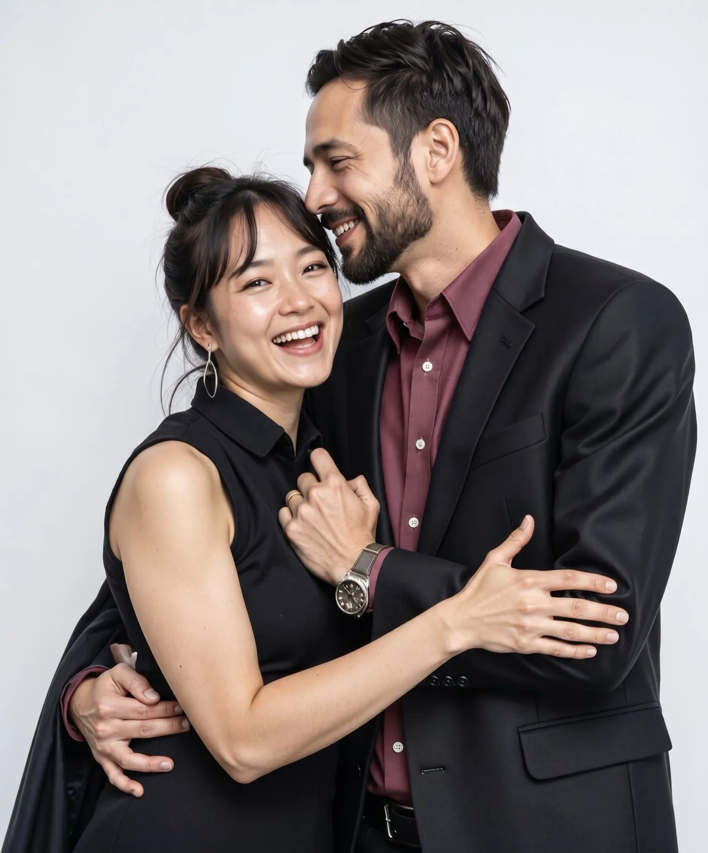 Couple smiling together in formal event attire