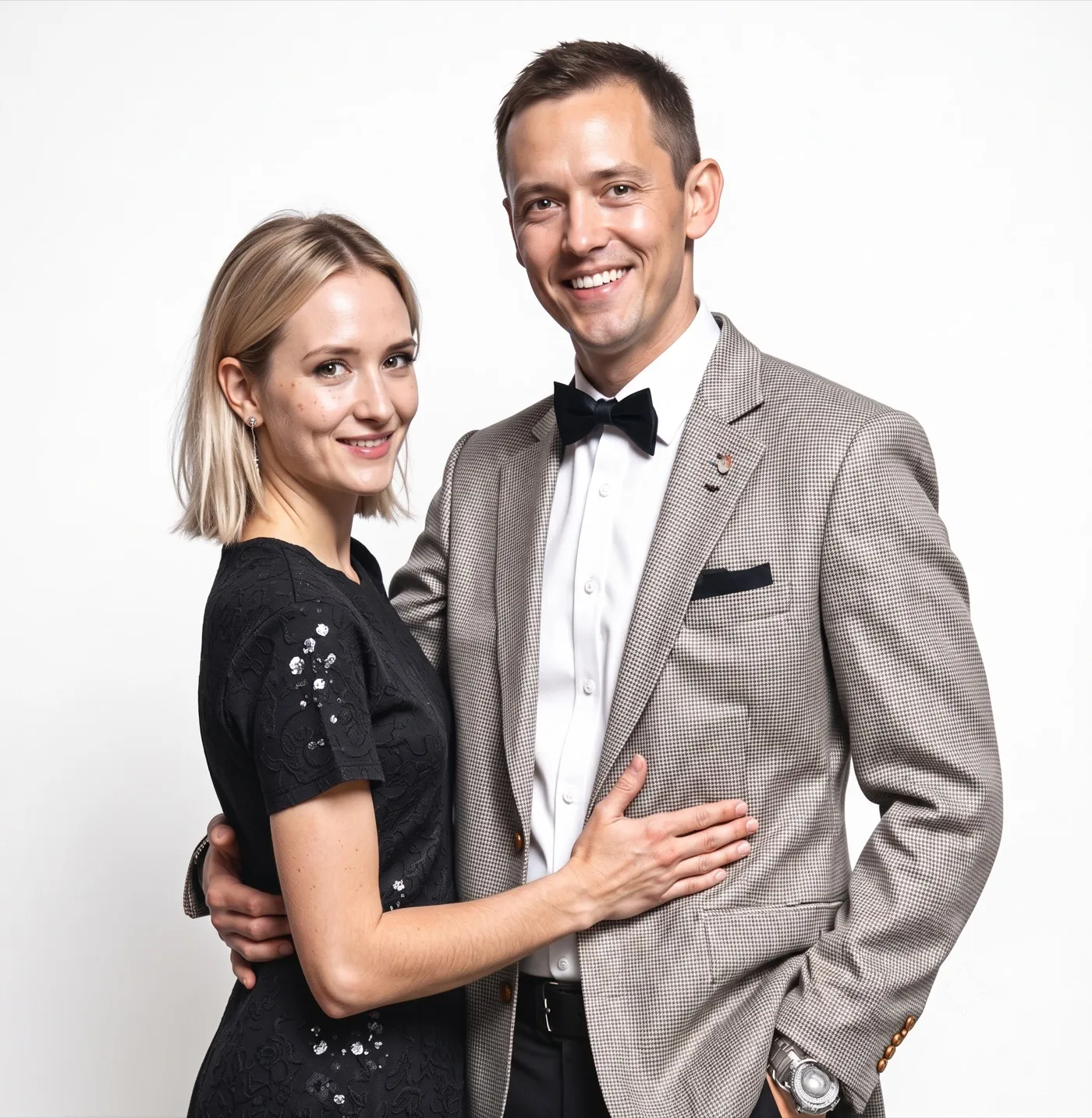 Couple portrait with gray suit and black dress